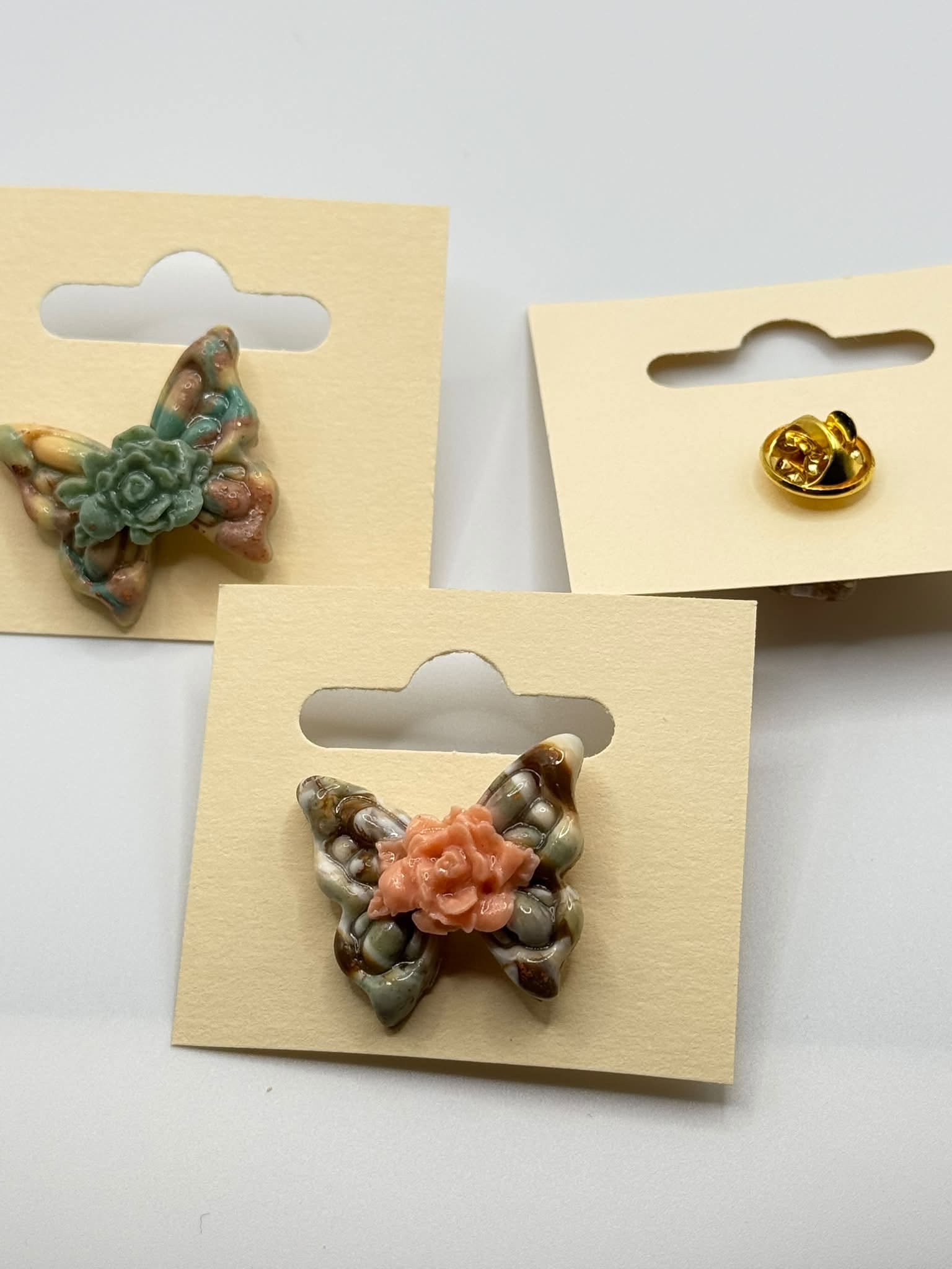 Green and orange marbled butterfly jewellery by Susie